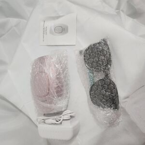 Pink Electronic Device with Accessories